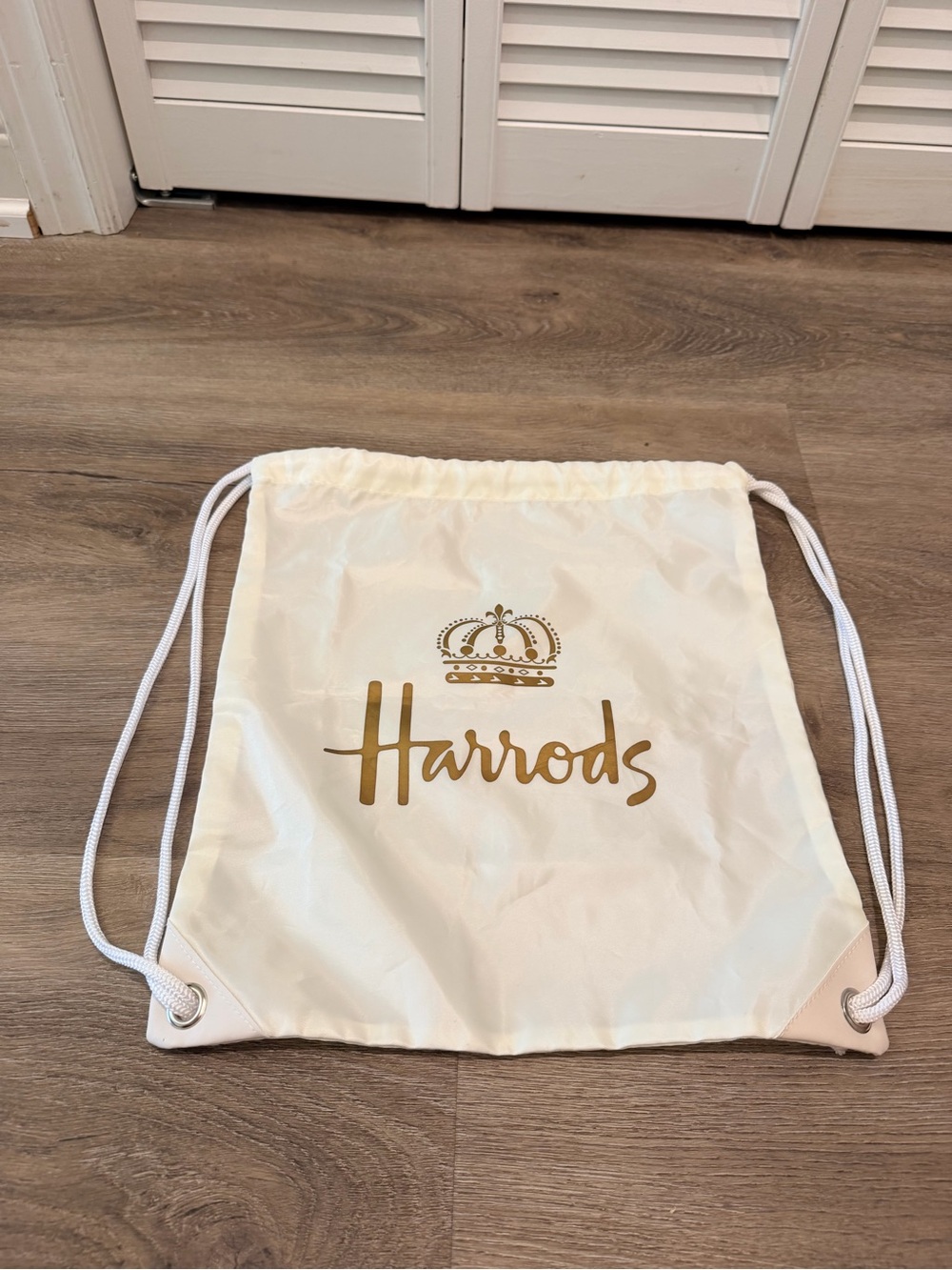 Harrods Cream Drawstring Bag with Gold Logo